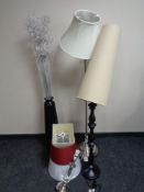 Two contemporary floor lamps with shades,