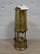 A brass Eccles type 6 protector miners lamp