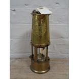 A brass Eccles type 6 protector miners lamp