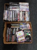 Two boxes of DVD's and board games
