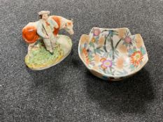 A glazed pottery fruit bowl together with a Staffordshire figure