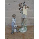 A Lladro figure number 6974 - boy with soft toy together with a Nao figure of a golfer