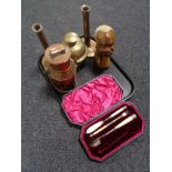 A tray of antique copper candlesticks, lidded flask, brass bell, carved sculpture,
