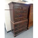 A George III mahogany chest on chest on bracket feet