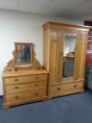 An Edwardian pine mirror door wardrobe and dressing chest CONDITION REPORT:
