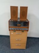 A twentieth century teak cased Van Der Molen turntable with speakers on beech three drawer chest