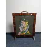 A 1930's tapestry fire screen