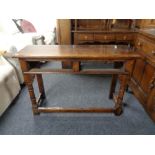 An oak side table (missing drawers)