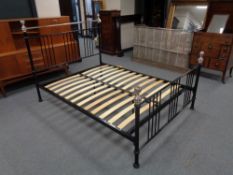 A metal 5' bed frame