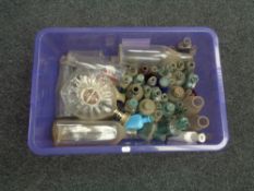 A crate of antique and later glass bottles