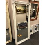 A 5' x 2' white traditional style mirror