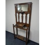 An Edwardian oak mirrored hall stand