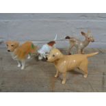 Four Beswick figures - Beagle, Golden Labrador,