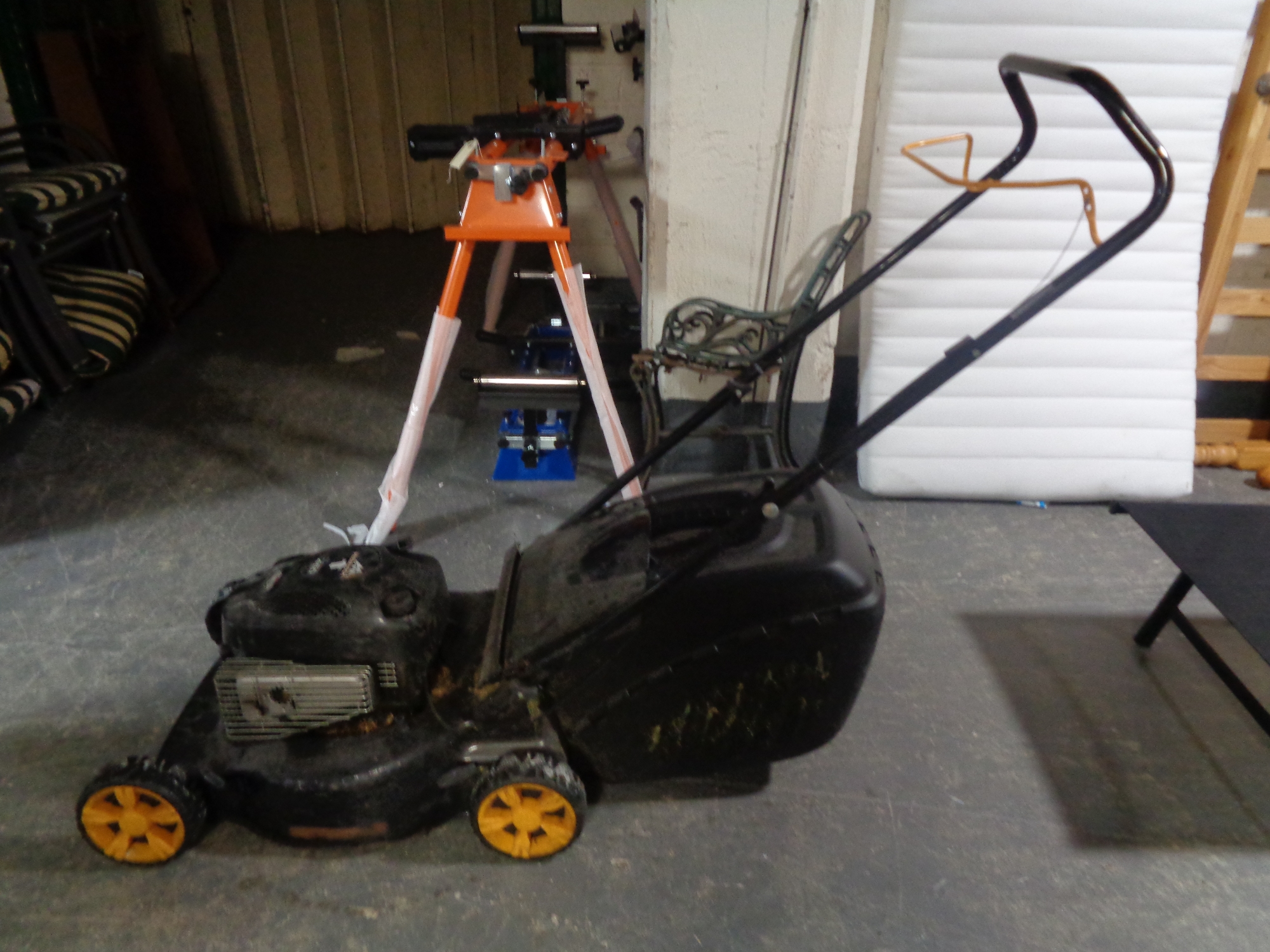 A Briggs & Stratton McCulloch petrol mower