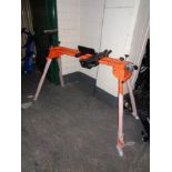 A folding table saw trestle stand (orange)