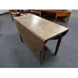 A Victorian drop leaf table