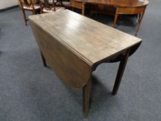 A Victorian drop leaf table