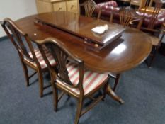 A Regency style twin pedestal dining table,