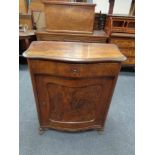 A nineteenth century continental walnut cabinet fitted cupboard and drawer