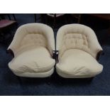 A pair of Victorian style button back tub chairs