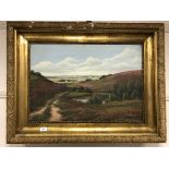 Continental school : gilt framed oil on canvas depicting a landscape,