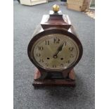 An early twentieth century continental balloon mantle clock with enamel dial (no door)