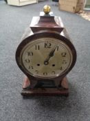 An early twentieth century continental balloon mantle clock with enamel dial (no door)