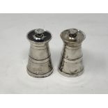 A pair of Hukin and Heath silver pepper mills (2)