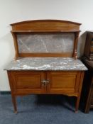 A late Victorian inlaid mahogany marble topped washstand