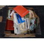 A box of assorted colour and monochrome postcards