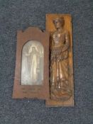 A carved oak panel depicting a lady carrying wheat together with an Edwardian oak framed black and