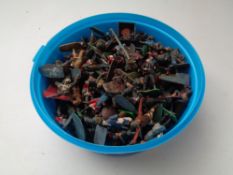 A tub of cast lead and die cast military and other figures