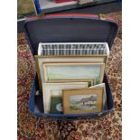 A vintage luggage case containing electric panel heater, pictures, prints, D.