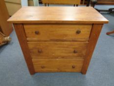 A nineteenth century pine three drawer chest