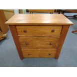 A nineteenth century pine three drawer chest
