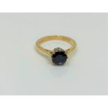 An 18ct gold sapphire solitaire ring, size L CONDITION REPORT: 3.