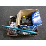 A box of wall paper steamer, cordless vac, charger,