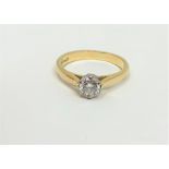 An 18ct gold solitaire diamond ring, approximately 0.