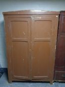 A 19th century painted pine double door cupboard