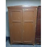 A 19th century painted pine double door cupboard