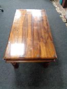 A sheesham wood coffee table