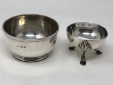 A Brittania silver salt together with a Brittania silver sugar bowl, 329g.