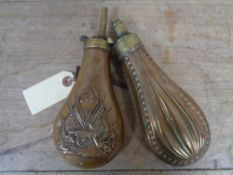 Two brass and copper black powder flasks