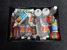 A crate of instant nails adhesive, white sprit, PVA glue,