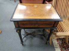 A nineteenth century continental burr walnut and ebonised work table