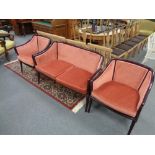 A three piece continental salon suite comprising of two seater settee and pair of armchairs