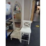 A cream and gilt cheval mirror and a bar stool