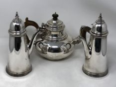 A Brittania silver teapot together with pair of coffee pots, 2295g.