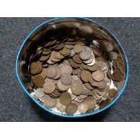 A tin of pre decimal pennies and half pennies