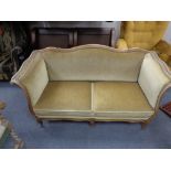 An early twentieth century continental beech two seater salon settee